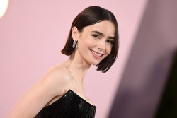 Lily Collins at the “Emily in Paris” Season 4, Part 1 Premiere held at The Egyptian Theatre Hollywood on August 14, 2024 in Los Angeles, California.